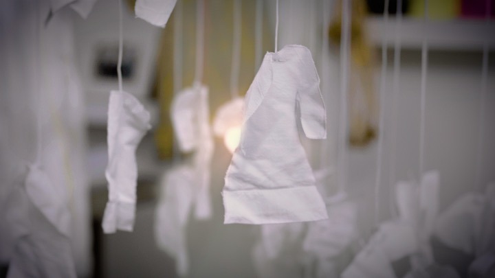 Artist Susan Aldworth demonstrates an early mockup of her Out of the Blue installation 1