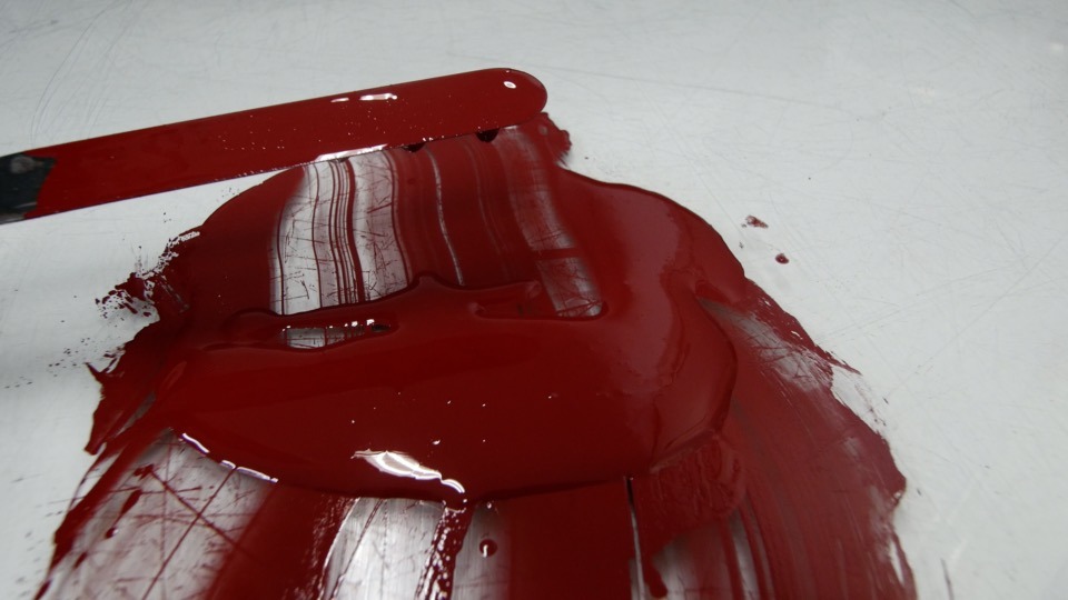Printmaker Eunice Routledge mixing ink 1